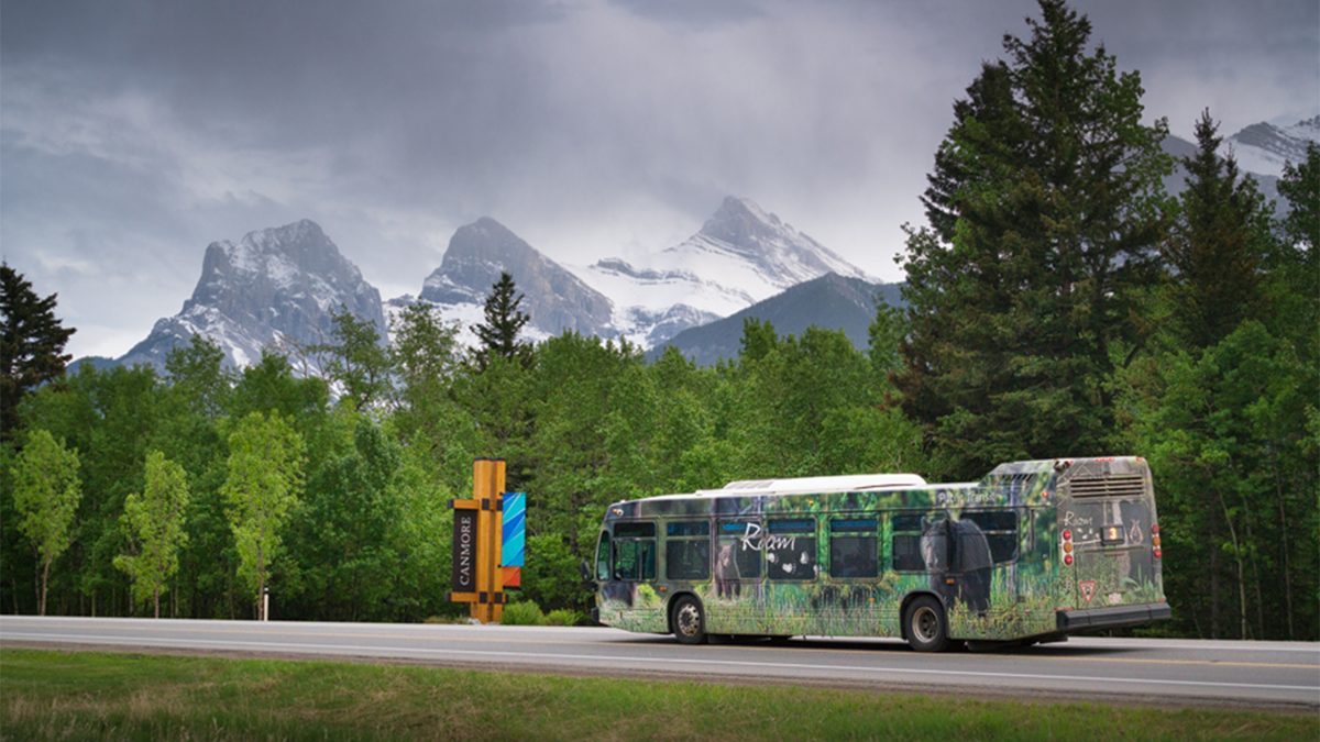 Bus driving into Canmore.