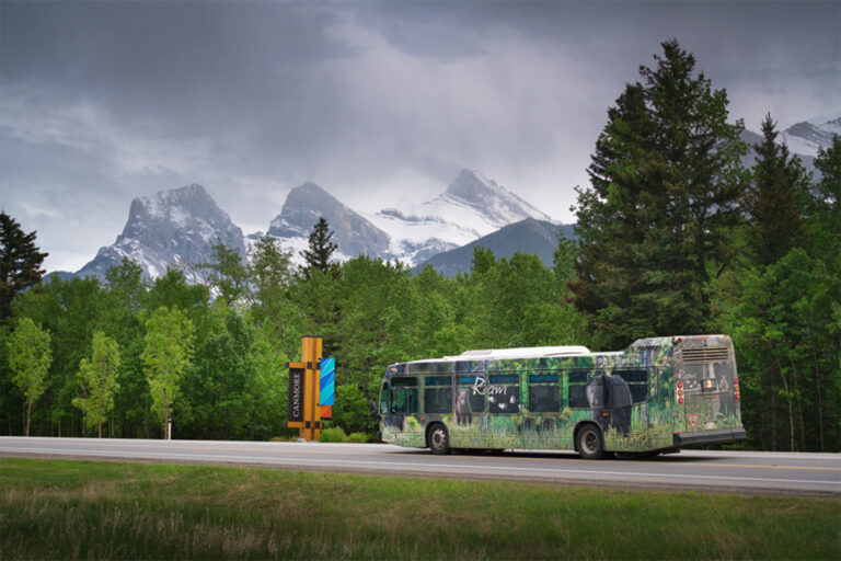 Bus driving into Canmore. 